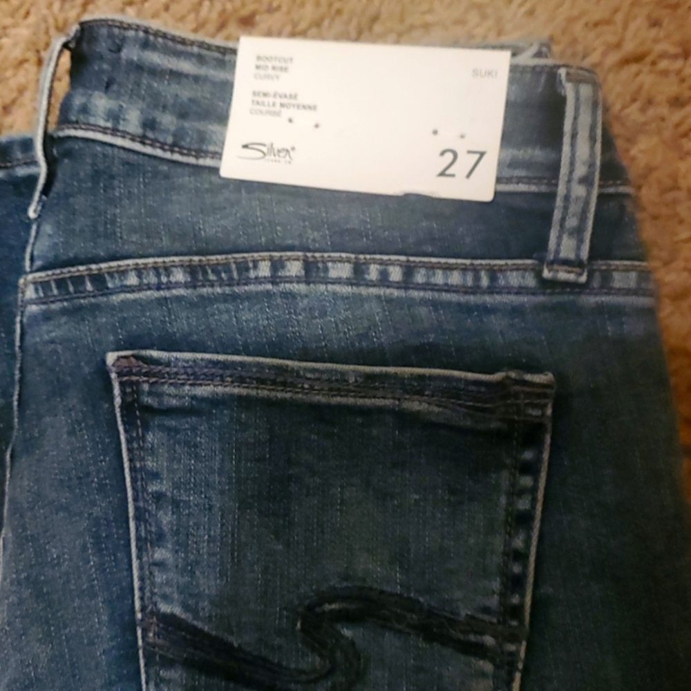 Brand new with tags Silver Suki size 27 regular length boot cut